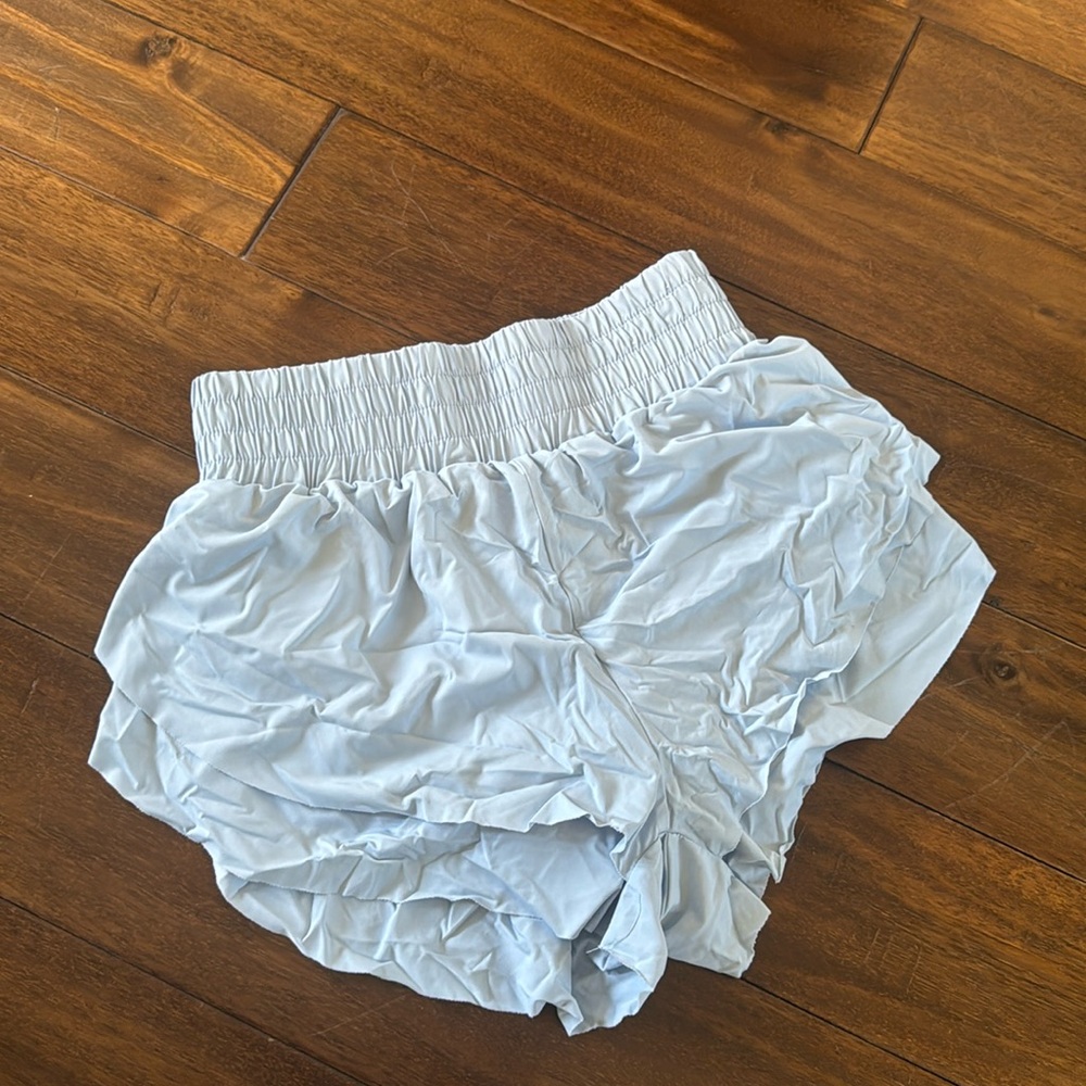 Blue ruffle running shorts